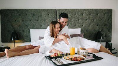 Couple relaxing with room service