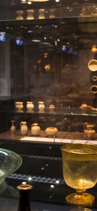 Glass display cabinets with glass, ceramic and other intersting artefacts