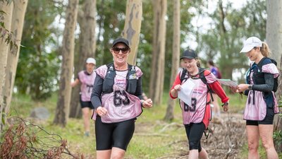 a team is running at the Women Only Adventure Race
