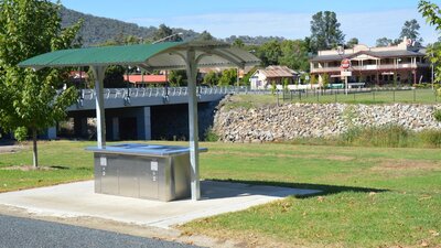 Barbeque area at Caravan park entrance, looking over creek towards the Royal Hotel