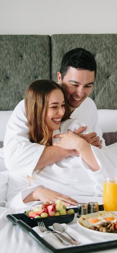 Couple relaxing with room service