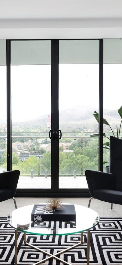 Situated on a high floor with breathtaking views over Glebe Park and Mount Ainslie