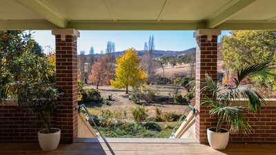 view from a verrandah overlooking a garden in autumn