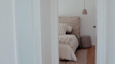 Luxury bedroom down a hall way