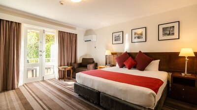 Hotel Room With King Bed and Courtyard View