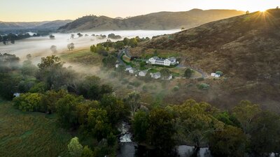 Cottages on the hill with the sun rising