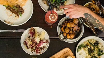 Food on table cooked by the Three Blue Ducks