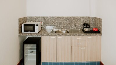 Queen Sofa Studio Kitchenette with microwave, fridge, tea and coffee