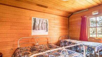 Bedroom in The Pines Cottage, Kosciuszko National Park. Photo: Murray Vanderveer/OEH
