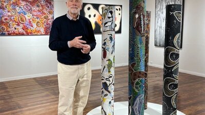 Owner Robert Stephens with Indigenous artworks