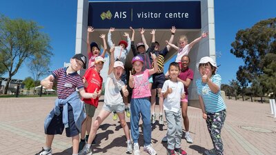 A group of children outside the Australian Institute of Sport