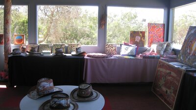 Looking out the windows of the lower level to the grasslands surrounding the Gallery
