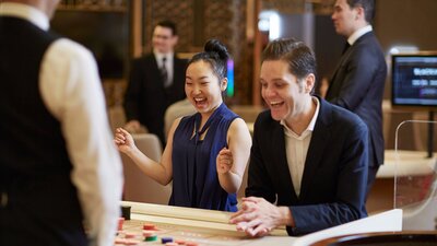 Happy punters at a gaming table