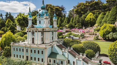 A handmade castle surrounded by well-kept garden