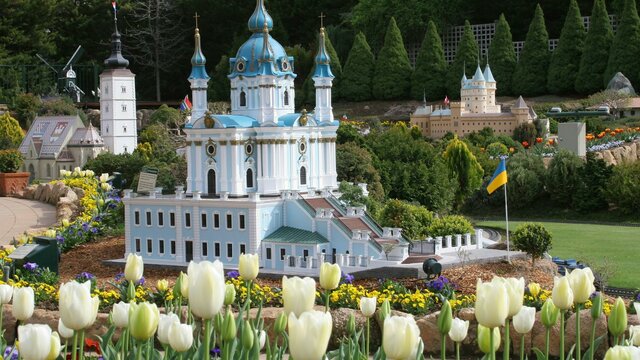 Miniature Building and Tulips Miniature building with flowers