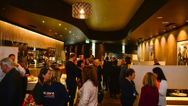 Dendy Premium Lounge Patrons gather in the premium lounge bar before a movie