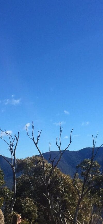 Woman standing at the top of Gibraltar Peak