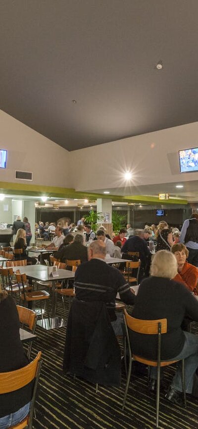 A busy bar area with lots of seating