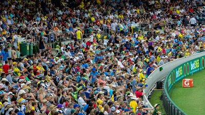 Full cricket stands during a day match