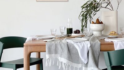 Dining table with vase.