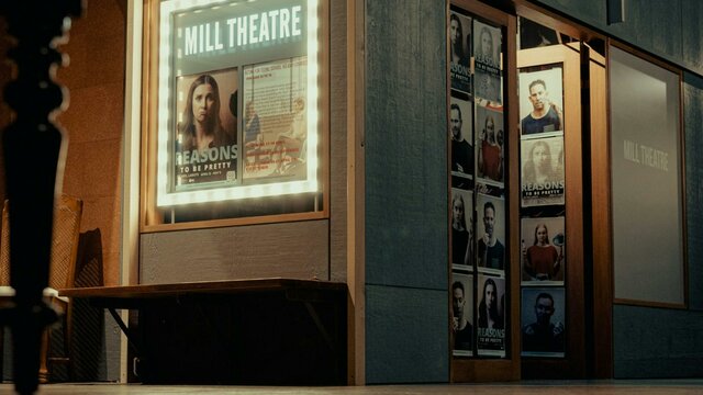 Outside the Mill Theatre, lightbox and doorway