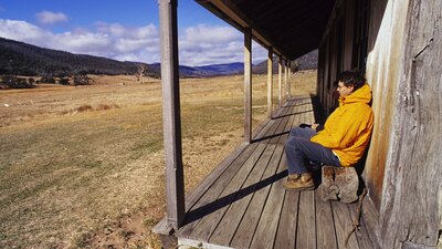 Hiker resting at Orroral Homestead