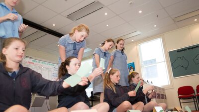 Students counting votes in a mock election