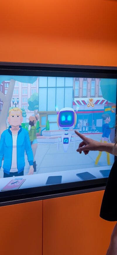 Woman playing touchscreen game in DemocraCity