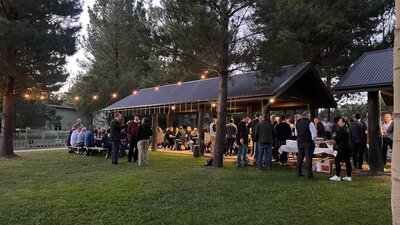 Large catered function in the viewing park, guests celebrating a corporate party with drinks and BBQ