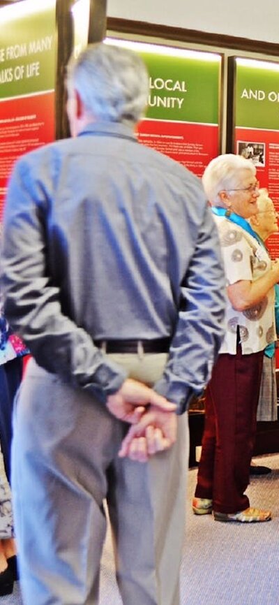 People viewing exhibition at inside the Church