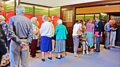 People viewing exhibition at inside the Church