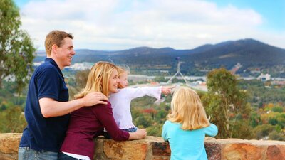 Family looking over Canberra from Red Hill Lookout