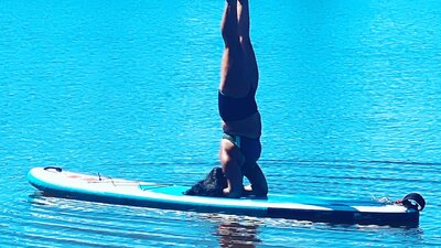 SUPFitness weekly group class of Yoga on SUP Boards