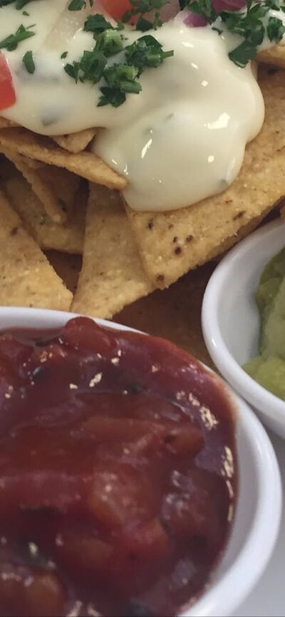 Plate of deconstructed nachos