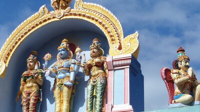 Statues on the roof of the Vishni Siva Mandir Temple and Library