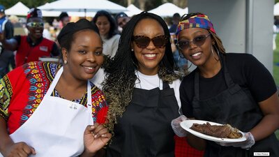 ladies smiling at African Festival in the Park