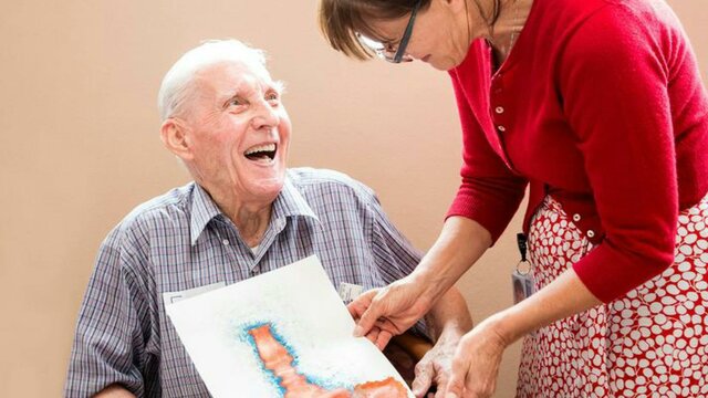 Art making with friends Visitor with artwork