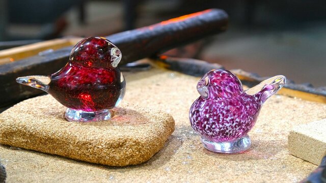 Glass birds from Make Your Own glassblowing class at Canberra Glassworks Two glass birds in the Hotshop