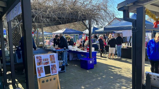 people browsing market stalls