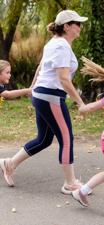 Mother and two kids participating in the fun run