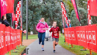 People running towards finish line