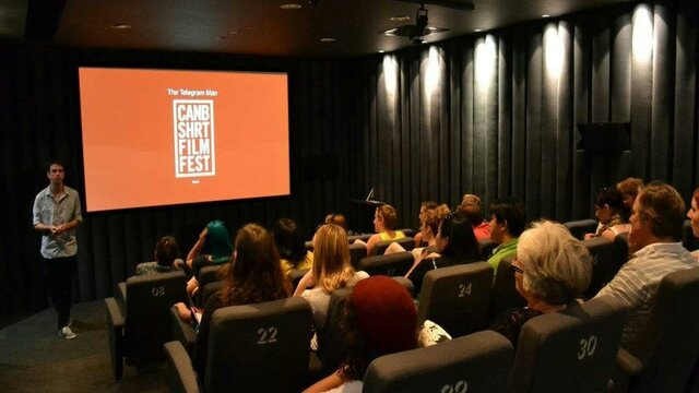CSFF screening Movie Screen showing CSFF logo with audience watching
