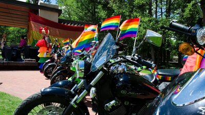 Motorbikes with rainbow flag decorations