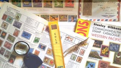 Stamp catalogues, stamp exhibit and gold medal award
