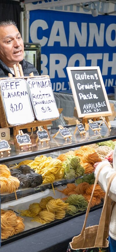 Fresh Pasta at Capital Region Farmers Market shoppers selecting fresh pasta from local farmers market in Canberra