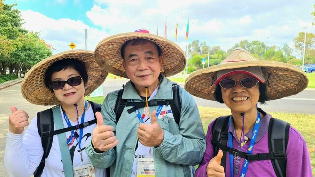Taiwanese participants 3 taiwanese women wearing traditional hats