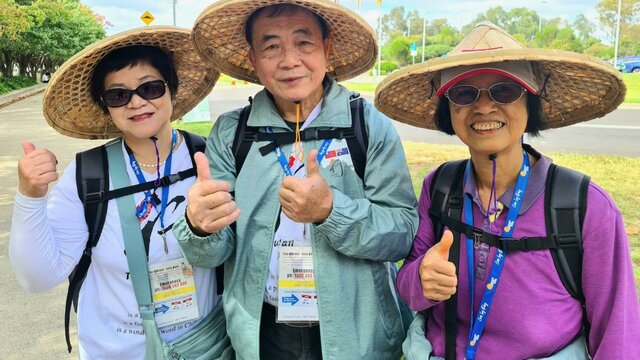 Taiwanese participants 3 taiwanese women wearing traditional hats