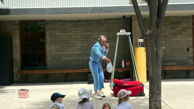 Dandy Man at Play Day street performer entertaining children