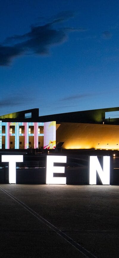 Enlighten letters displayed in front of Parliament House