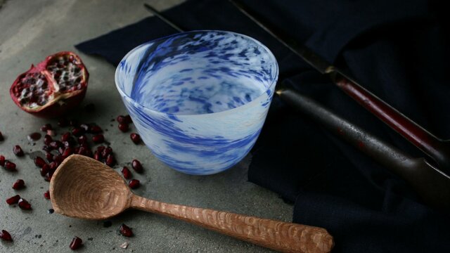 hand carved wooden spoon, and blown bowl